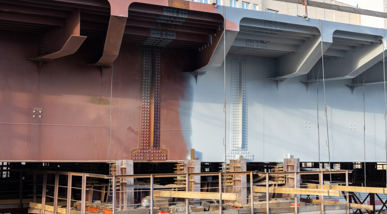 Zinc-rich protective coating applied to a steel bridge structure exposed to corrosion risks